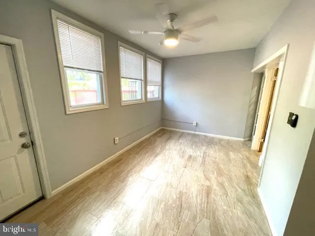 a kitchen with stainless steel appliances a refrigerator and a counter