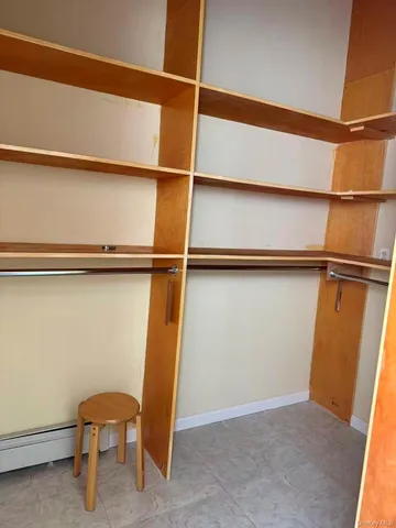 a view of a room with racks on the wall