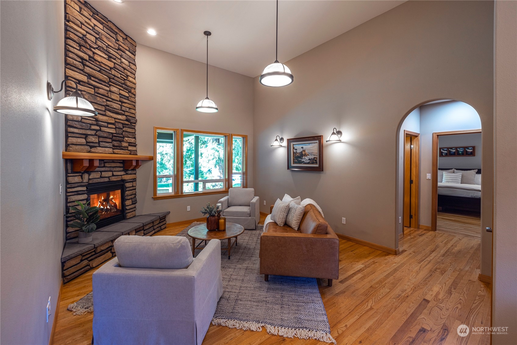6055 East Hemmi Road Bellingham, WA 98226 - Photo 17 of 40 a living room with furniture and a large window
