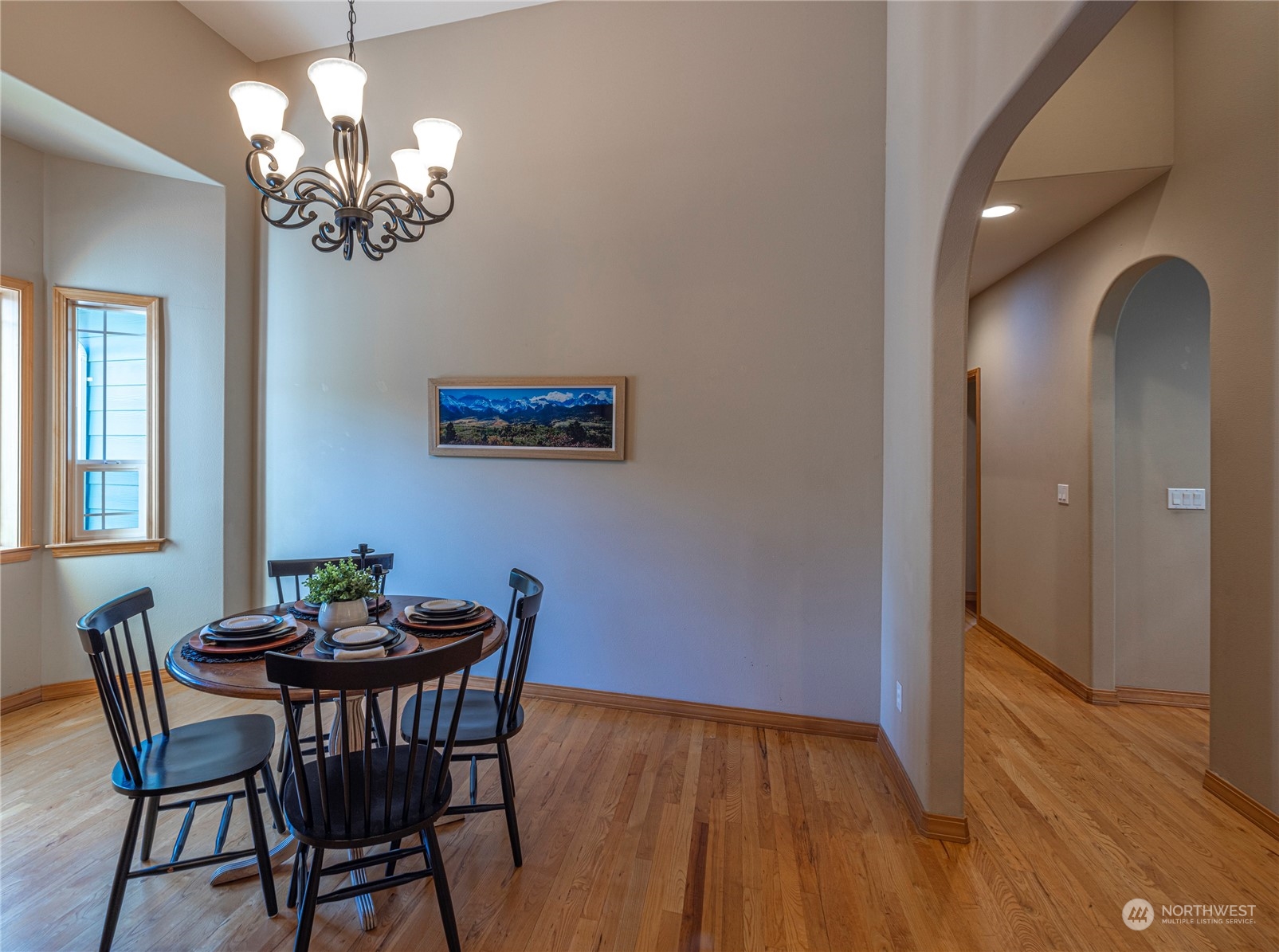 6055 East Hemmi Road Bellingham, WA 98226 - Photo 18 of 40 a view of a dining room with furniture and chandelier