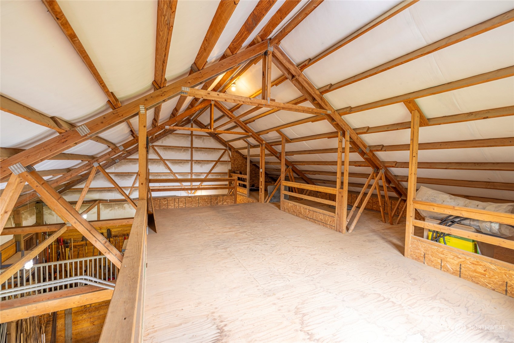 6055 East Hemmi Road Bellingham, WA 98226 - Photo 37 of 40 a view of a room with stairs and a wooden floor