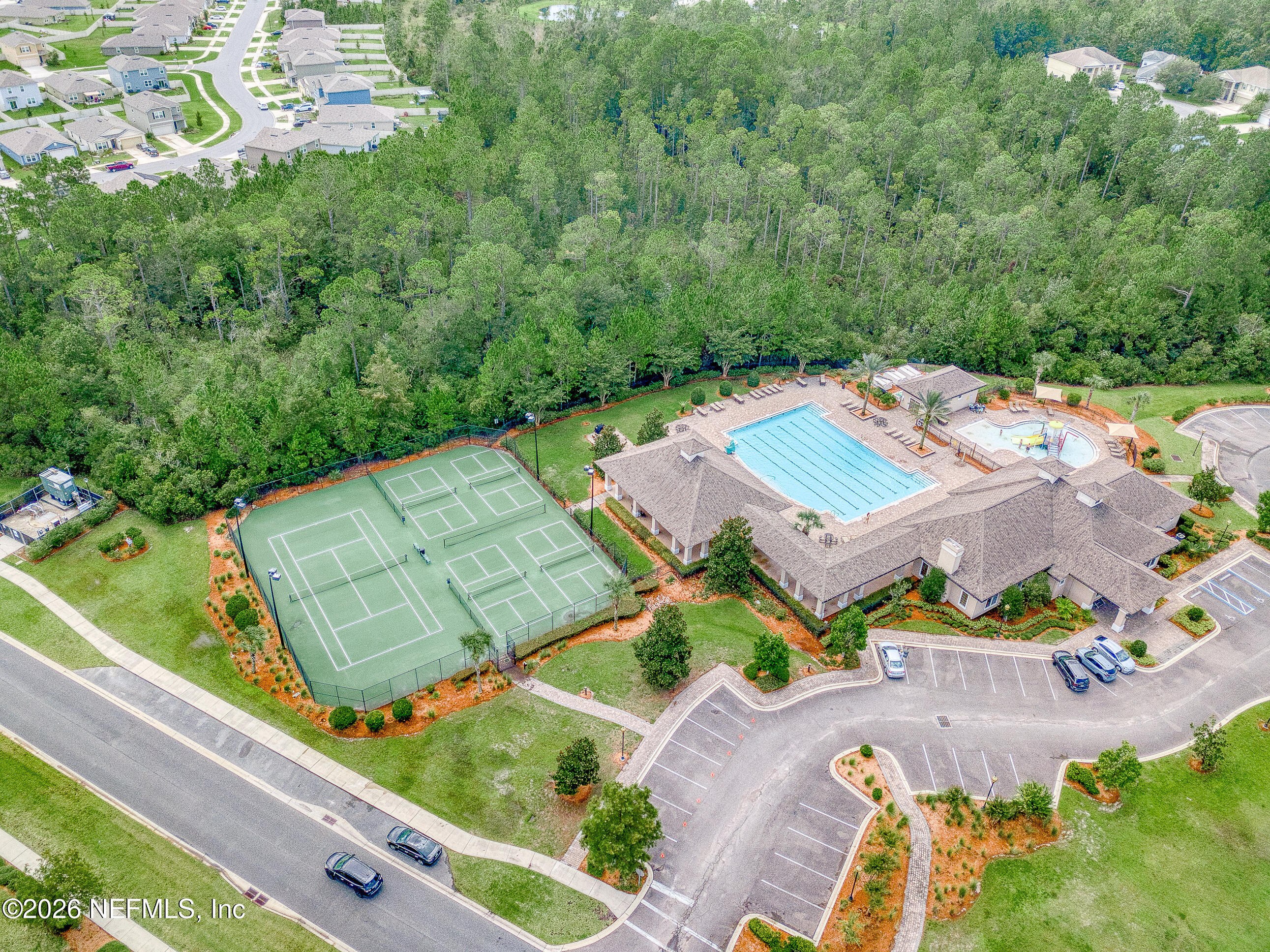 70144 Roseapple Court Yulee, FL 32097 - Photo 35 of 41 an aerial view of a house with a garden