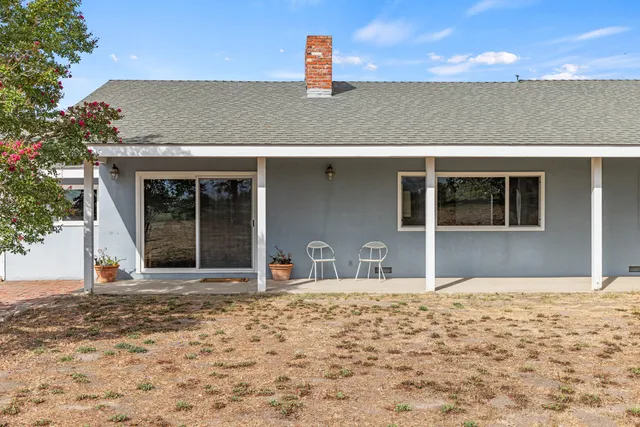 a house view with a outdoor space