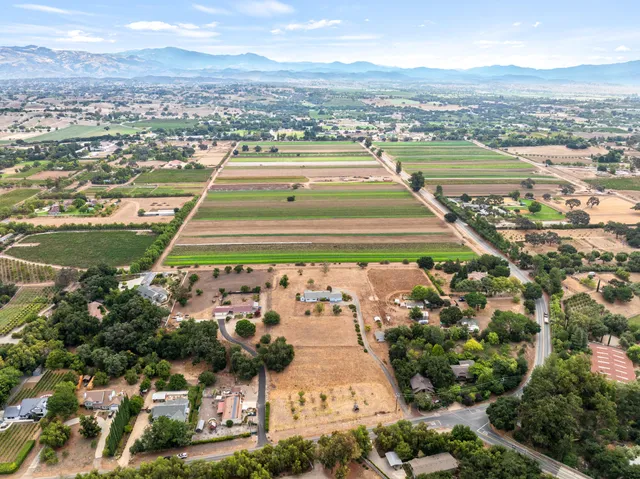 a view of a city with an ocean beach