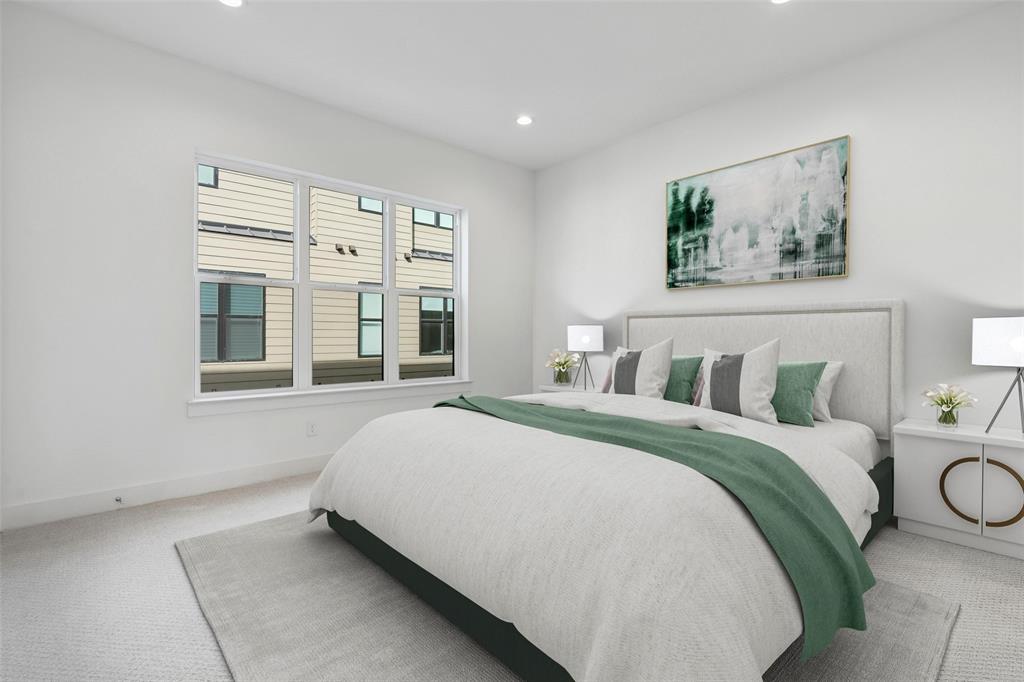 3048 ChImes Street Dallas, TX 75219 - Photo 13 of 35 a bed sitting in a bedroom next to a window