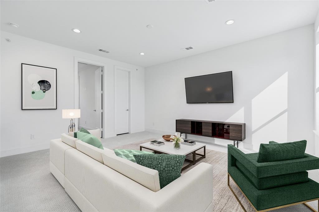 3048 ChImes Street Dallas, TX 75219 - Photo 20 of 35 a living room with furniture and a flat screen tv
