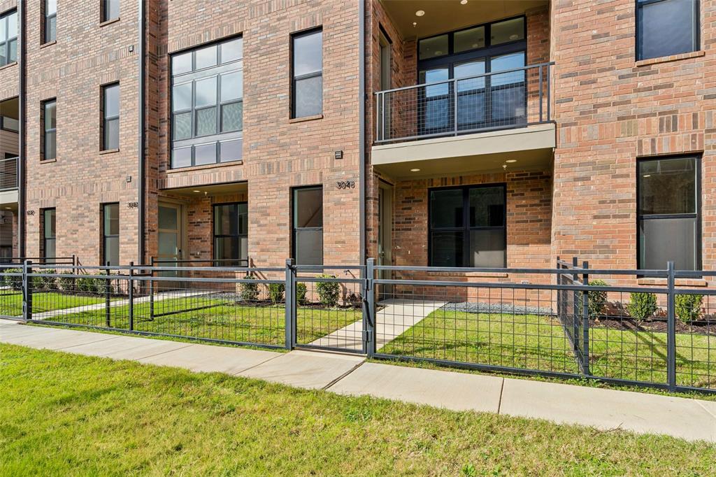 3048 ChImes Street Dallas, TX 75219 - Photo 2 of 35 a view of an house with backyard and porch