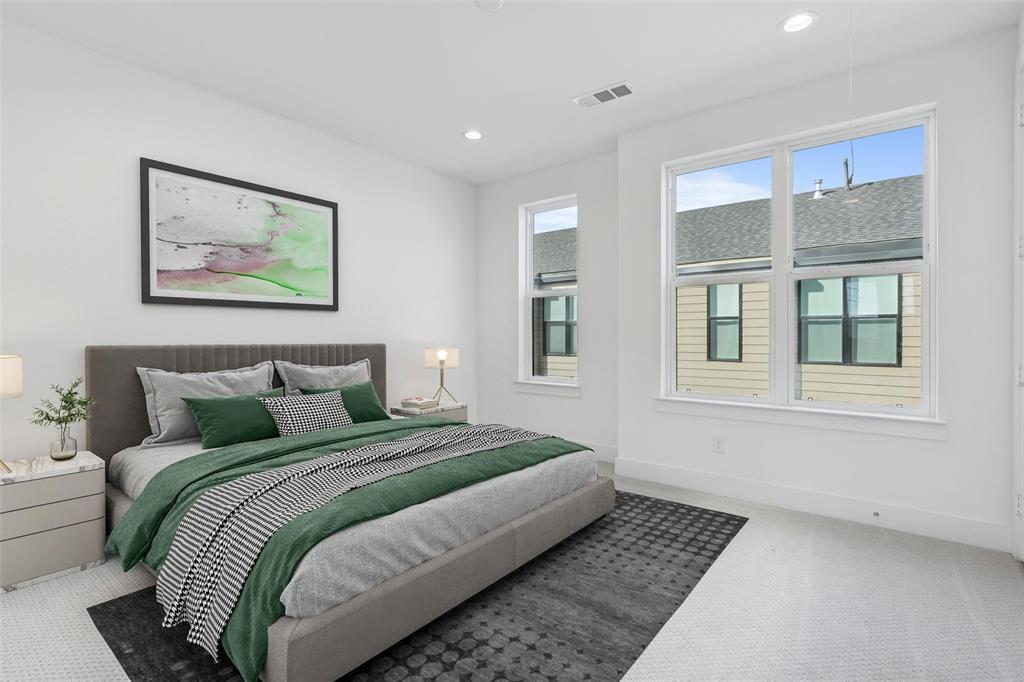 3048 ChImes Street Dallas, TX 75219 - Photo 22 of 35 a bedroom with bed and window