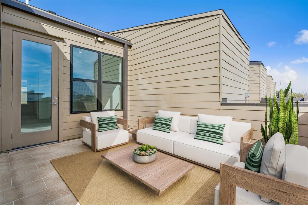 3048 ChImes Street Dallas, TX 75219 - Photo 29 of 35 a view of backyard with outdoor seating