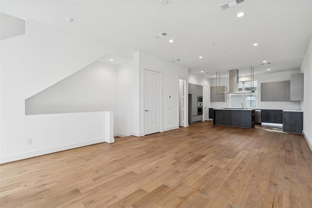3048 ChImes Street Dallas, TX 75219 - Photo 5 of 35 a view of a kitchen with a sink and a stove top oven