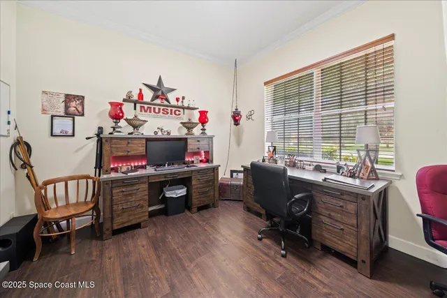 a spacious bathroom with a double vanity sink mirror and bathtub