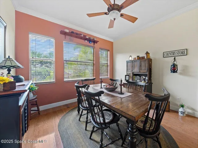 a kitchen with stainless steel appliances granite countertop a stove microwave and cabinets