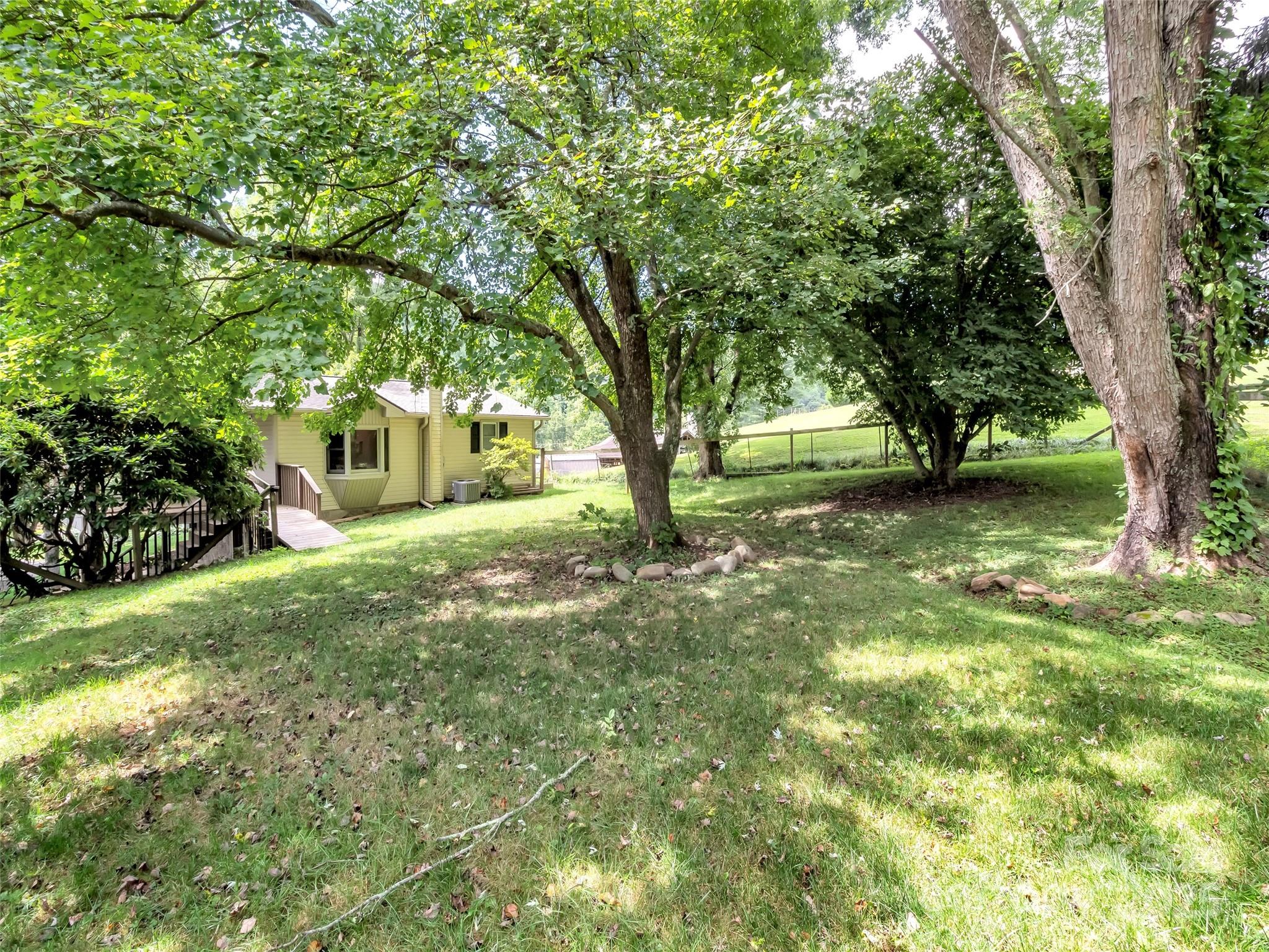 340 Mauney Cove Road Waynesville, NC 28786 - Photo 29 of 35 a view of yard with trees