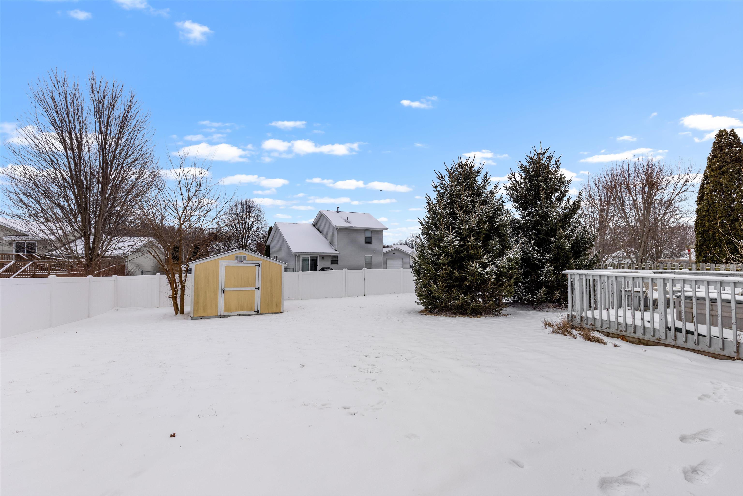 4193 Old Gate Road Rockford, IL 61109 - Photo 17 of 18 a view of a house with a snow in the background