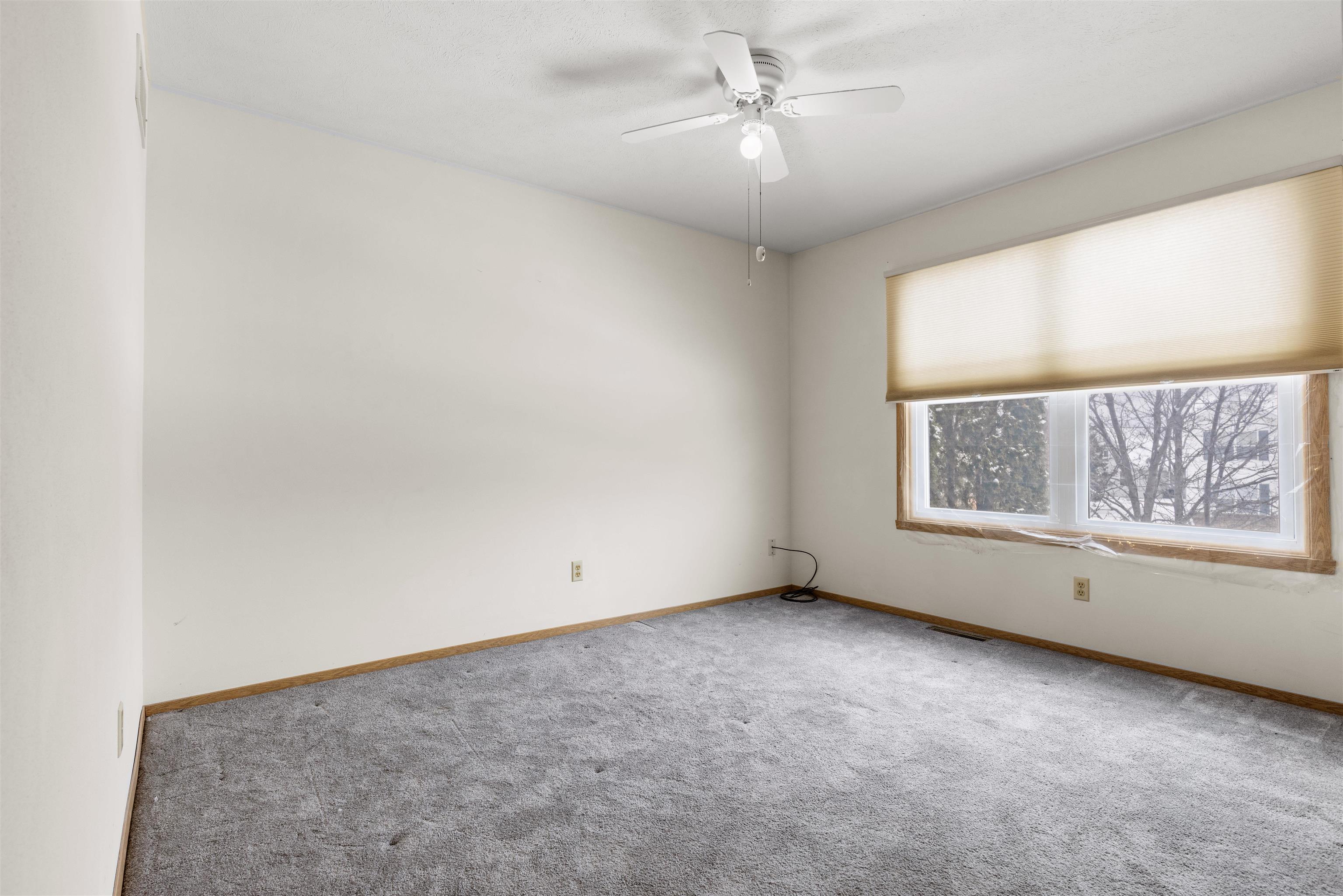 4193 Old Gate Road Rockford, IL 61109 - Photo 8 of 18 an empty room with a window