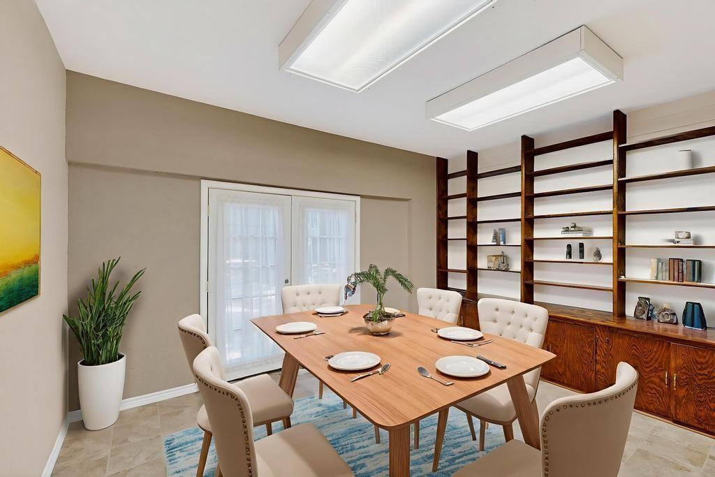 1505 Cedar Ridge Terrace Euless, TX 76039 - Photo 13 of 38 a view of a dining room and livingroom with furniture window and wooden floor