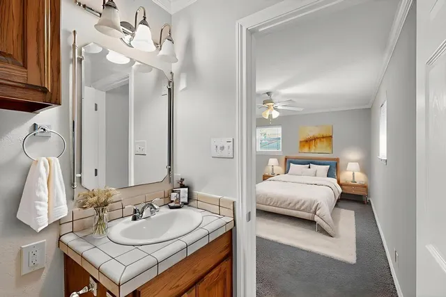 a bath tub sitting next to a window