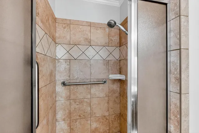 a view of storage and utility room with washer and dryer