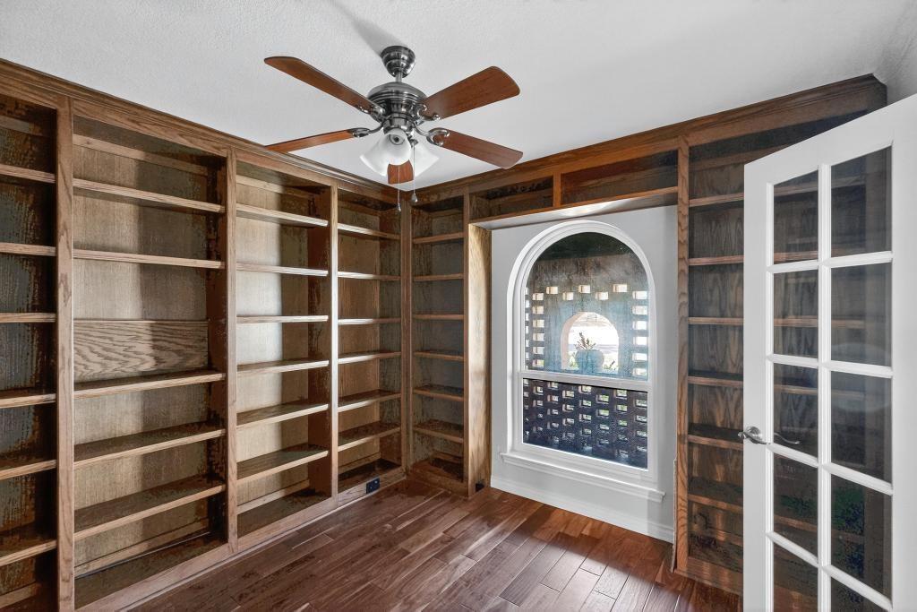1505 Cedar Ridge Terrace Euless, TX 76039 - Photo 3 of 38 a view of a livingroom with a large window and wooden floor