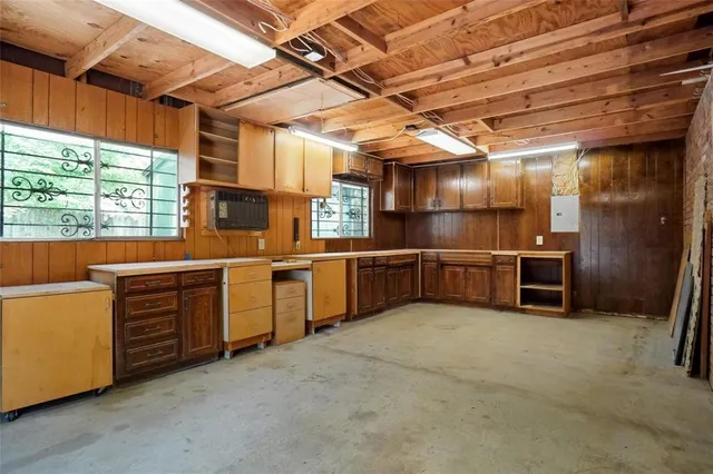 a view of a bench in the backyard