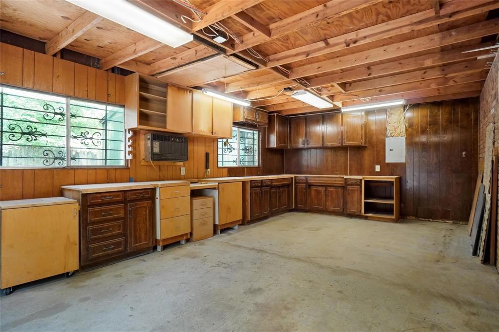 1505 Cedar Ridge Terrace Euless, TX 76039 - Photo 35 of 38 a kitchen with stainless steel appliances and white cabinets