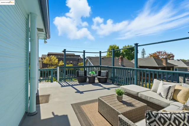 a view of a balcony with chairs