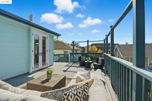 a view of balcony with furniture and outdoor seating