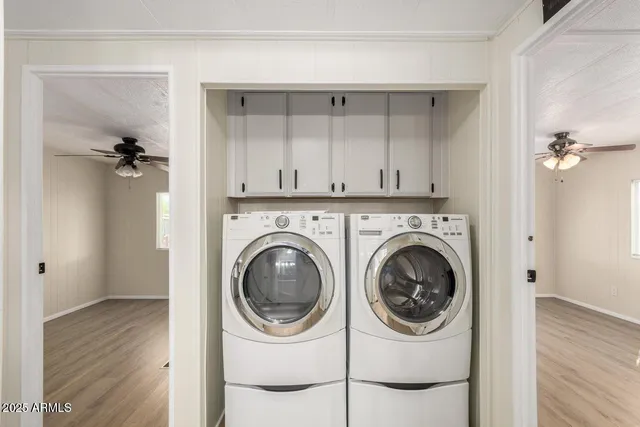 a utility room with dryer and washer