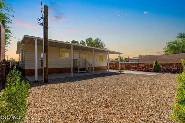 a house view with a backyard space
