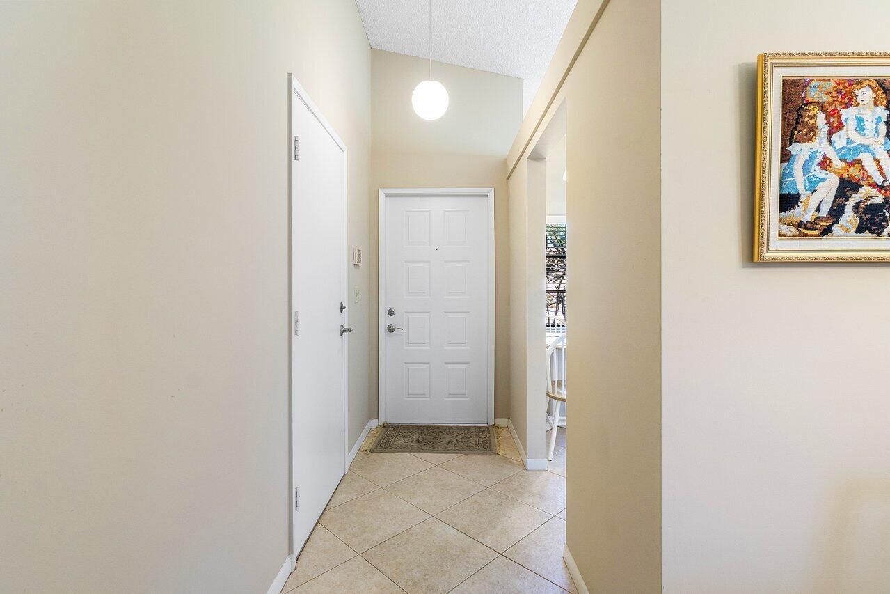 8090 Whispering Palm Drive, Unit A Boca Raton, FL 33496 - Photo 2 of 33 004-8090WhisperingPalmDrive-BocaRaton-FL