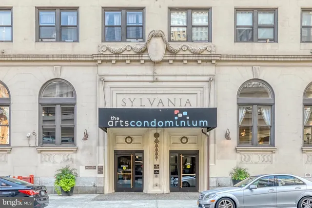 a kitchen with stainless steel appliances granite countertop a stove and cabinets
