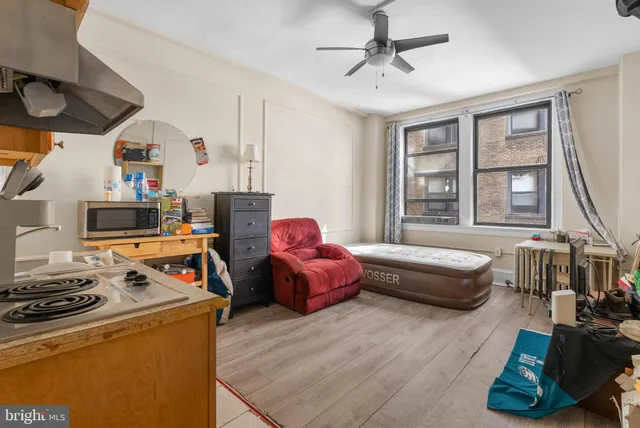 a living room with furniture and a window