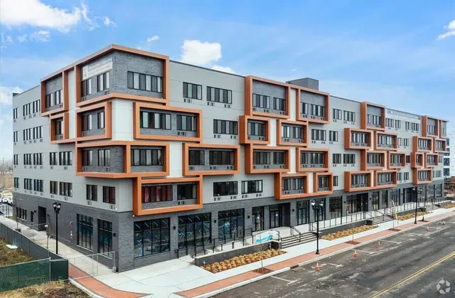 a front view of a building with glass windows