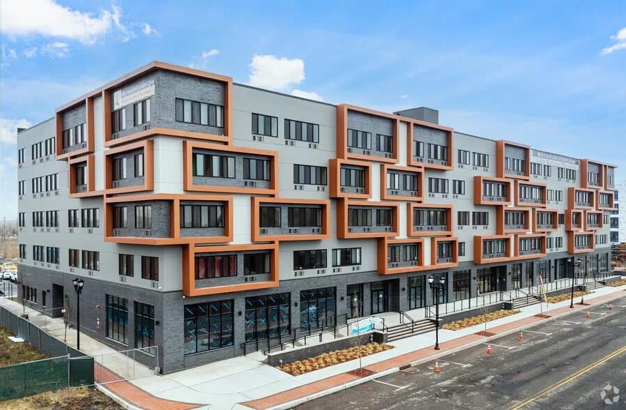 a front view of a building with glass windows