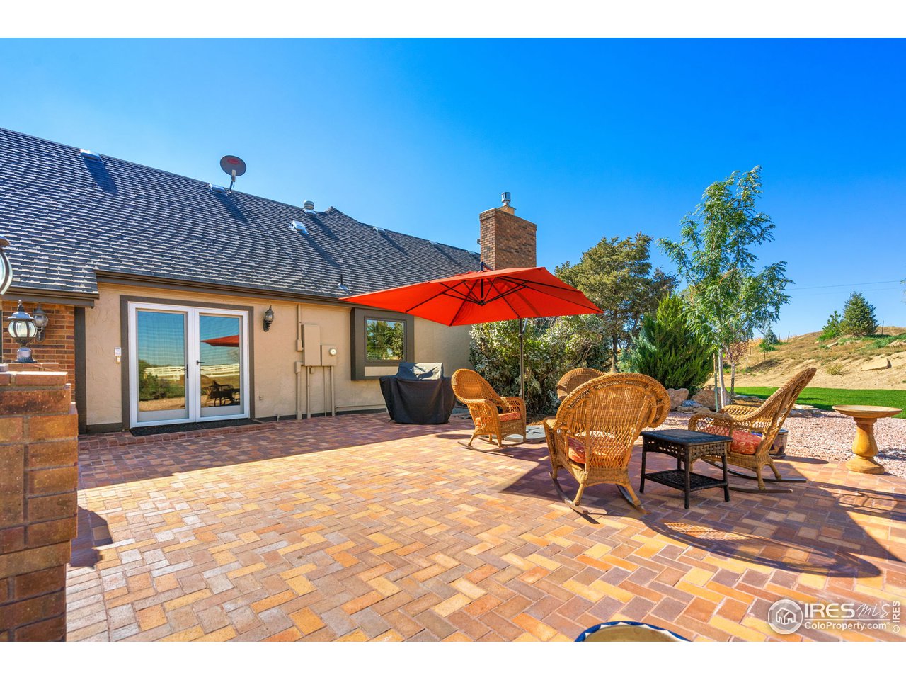 12 Dos Rios Greeley, CO 80634 - Photo 14 of 40 North Patio - Kitchen Access