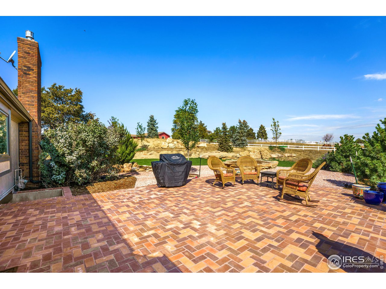 12 Dos Rios Greeley, CO 80634 - Photo 39 of 40 North Patio - Kitchen Access