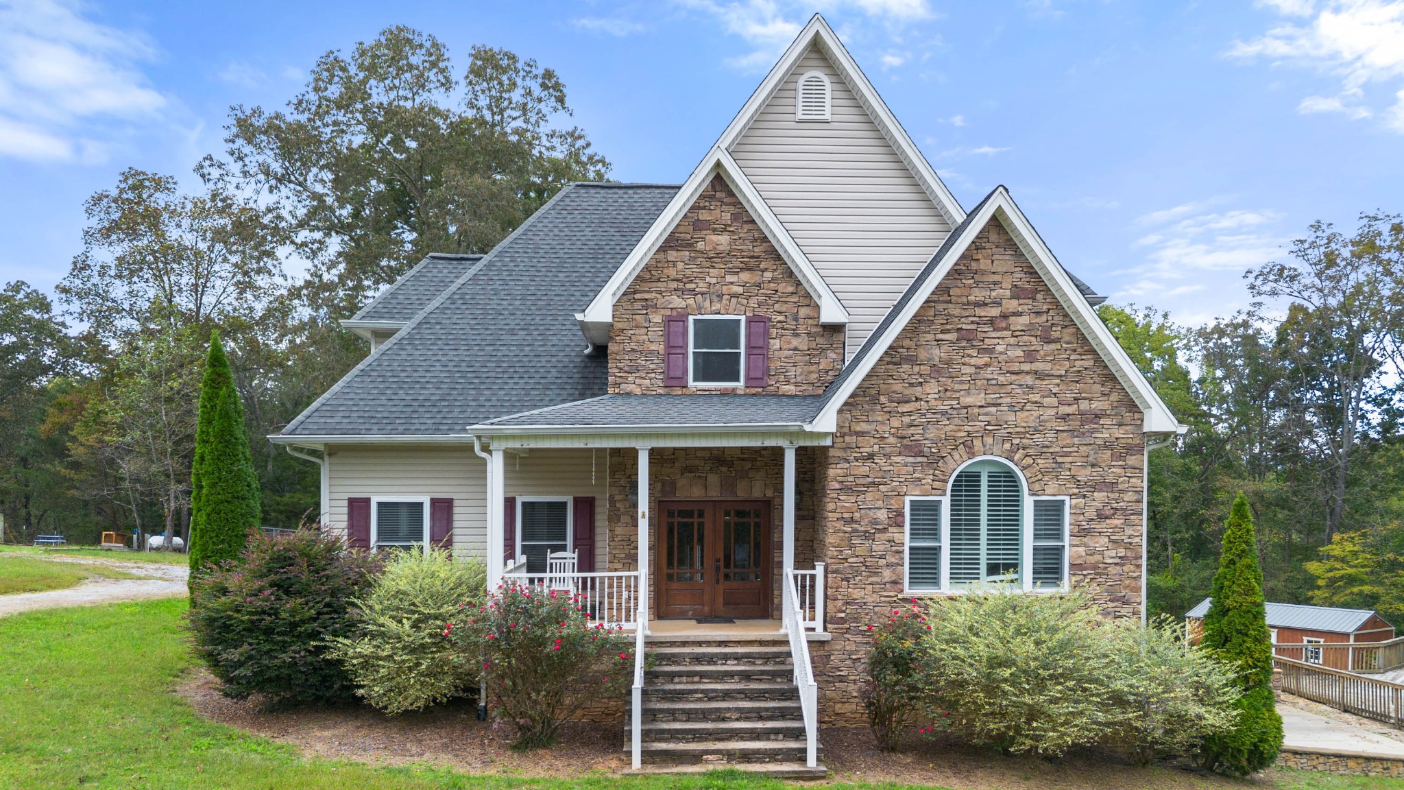 a front view of a house with a yard