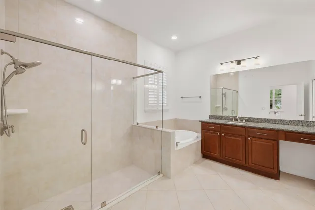 an aerial view of a house with swimming pool and outdoor space