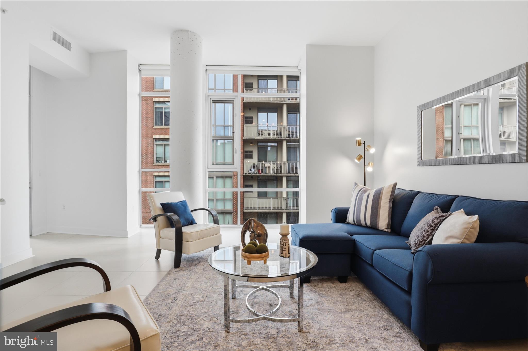 12025 New Dominion Parkway, Unit 505 Reston, VA 20190 - Photo 9 of 25 Living Room w/ Courtyard View