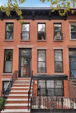 a view of front door and bedroom