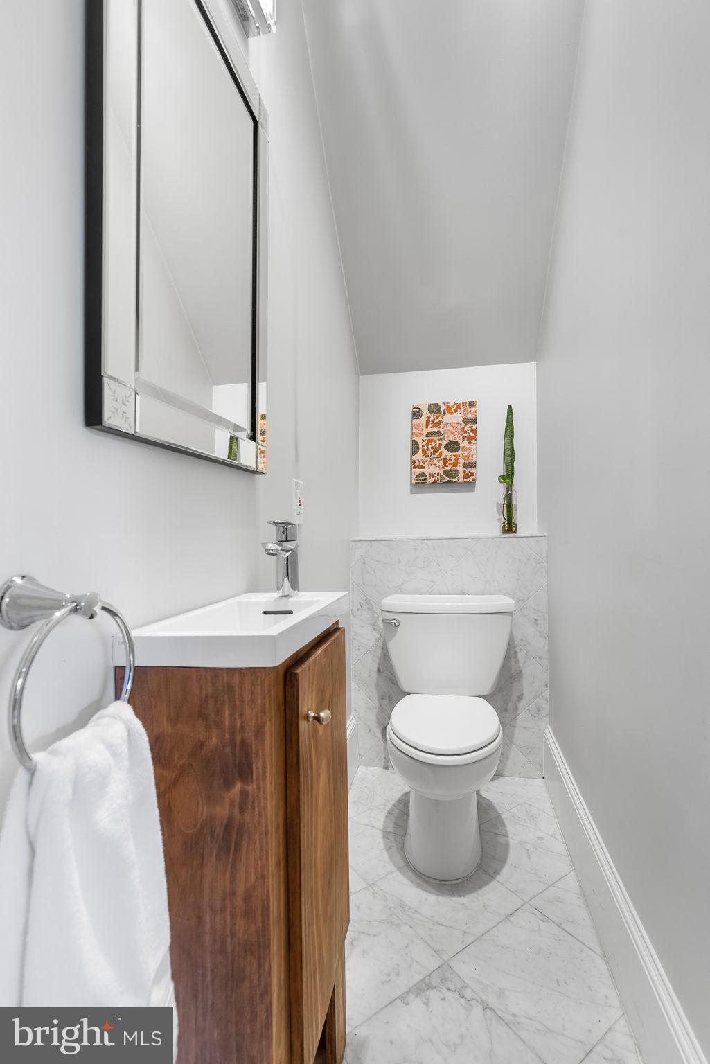 20 Logan Circle Northwest, Unit 12 Washington, DC 20005 - Photo 8 of 30 Half Bath Off Kitchen & Living Room