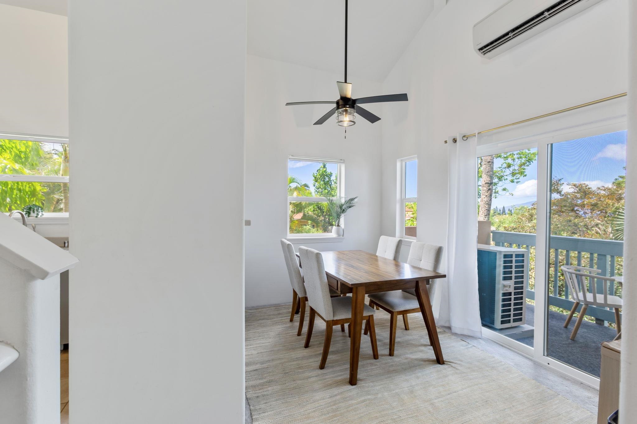 10 Heather Lane, Unit 231 Lahaina, HI 96761 - Photo 17 of 44 a view of a dining room with furniture and a window