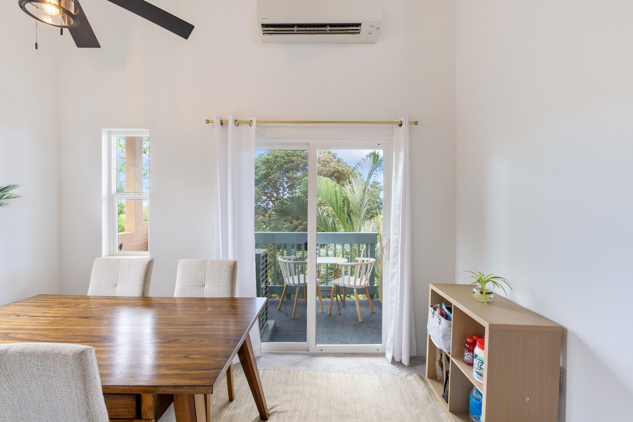 10 Heather Lane, Unit 231 Lahaina, HI 96761 - Photo 23 of 44 a view of a dining room with furniture and a window