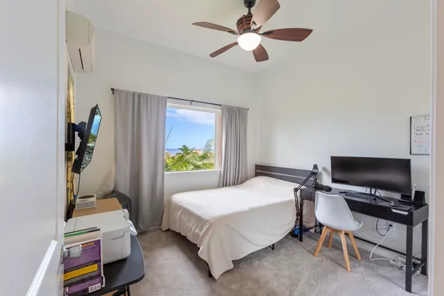 a room with furniture and a window