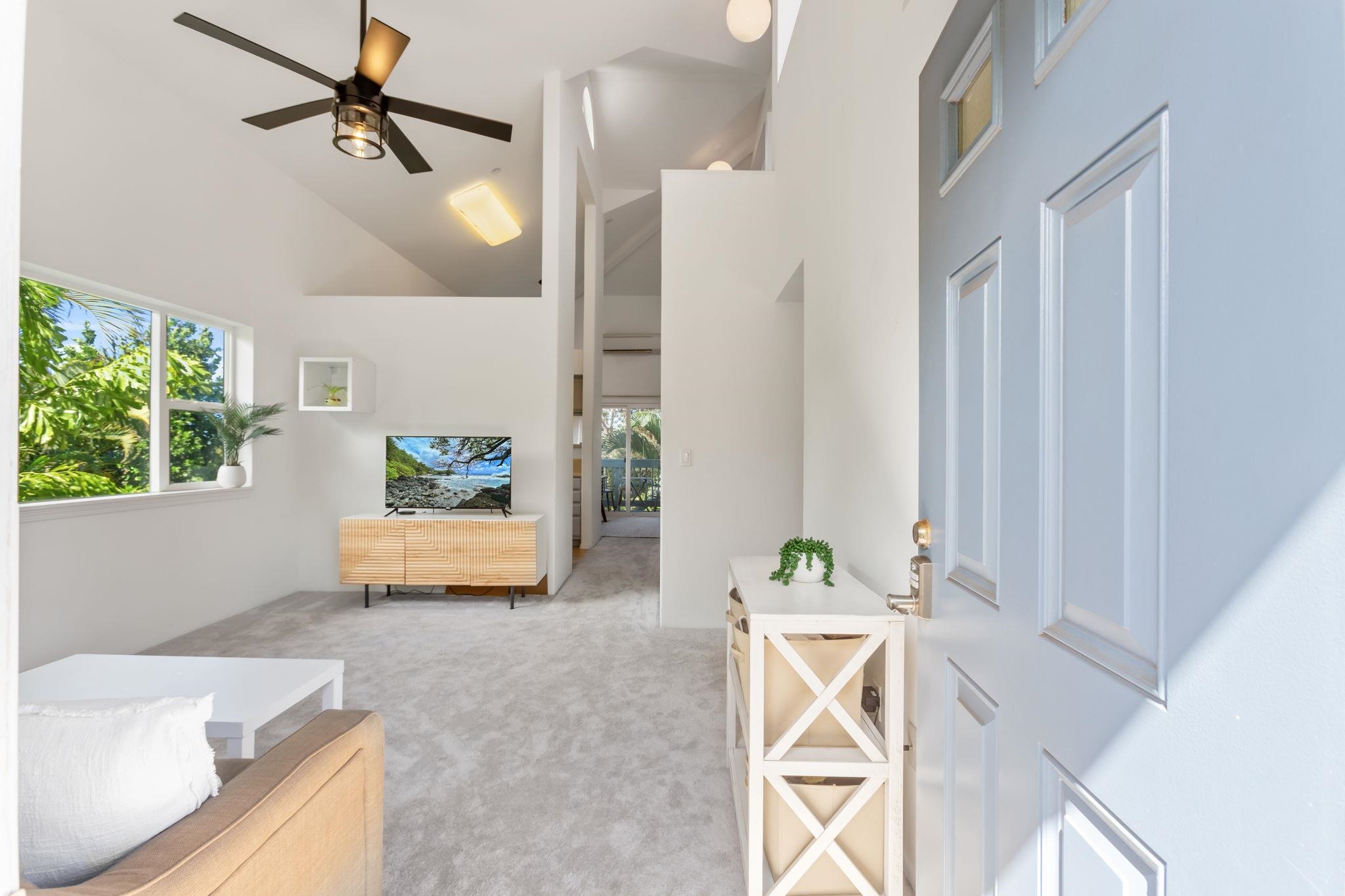 10 Heather Lane, Unit 231 Lahaina, HI 96761 - Photo 3 of 44 a view of living room kitchen with furniture and wooden floor