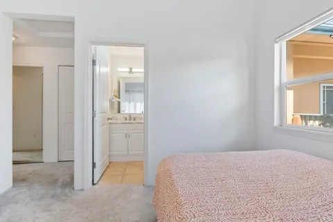 a bathroom with a shower and a bath tub