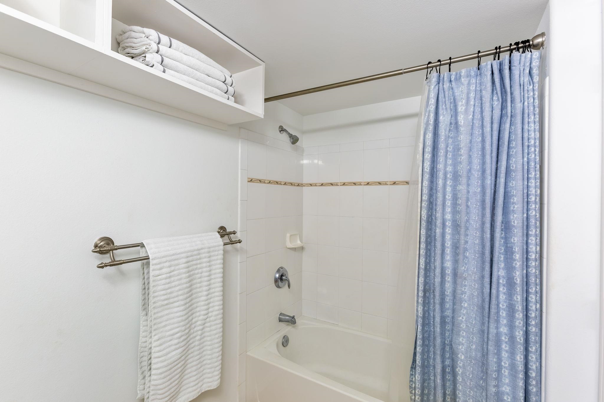 10 Heather Lane, Unit 231 Lahaina, HI 96761 - Photo 38 of 44 a bathroom with a shower and a bath tub