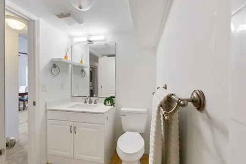 a view of a hallway with workspace