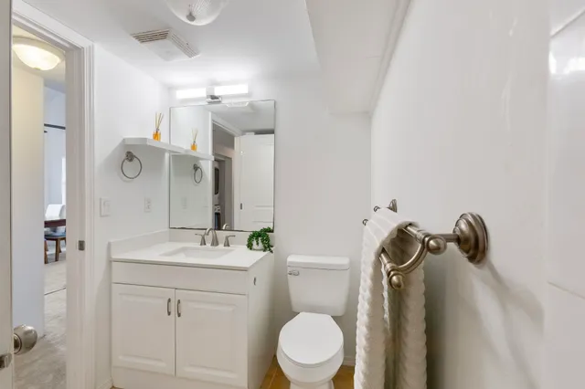 a view of a hallway with workspace