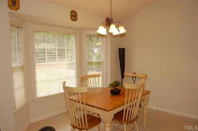 587 Blue Pond Road Clayton, NC 27520 - Photo 4 of 11 The dining room flows nicely into the family room, providing great opportunities for casual meals or entertaining friends and family. Other